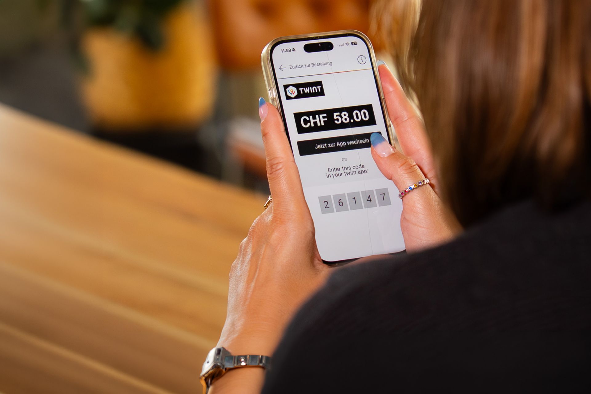 Handydisplay mit TWINT App mit 5-stelligem Code