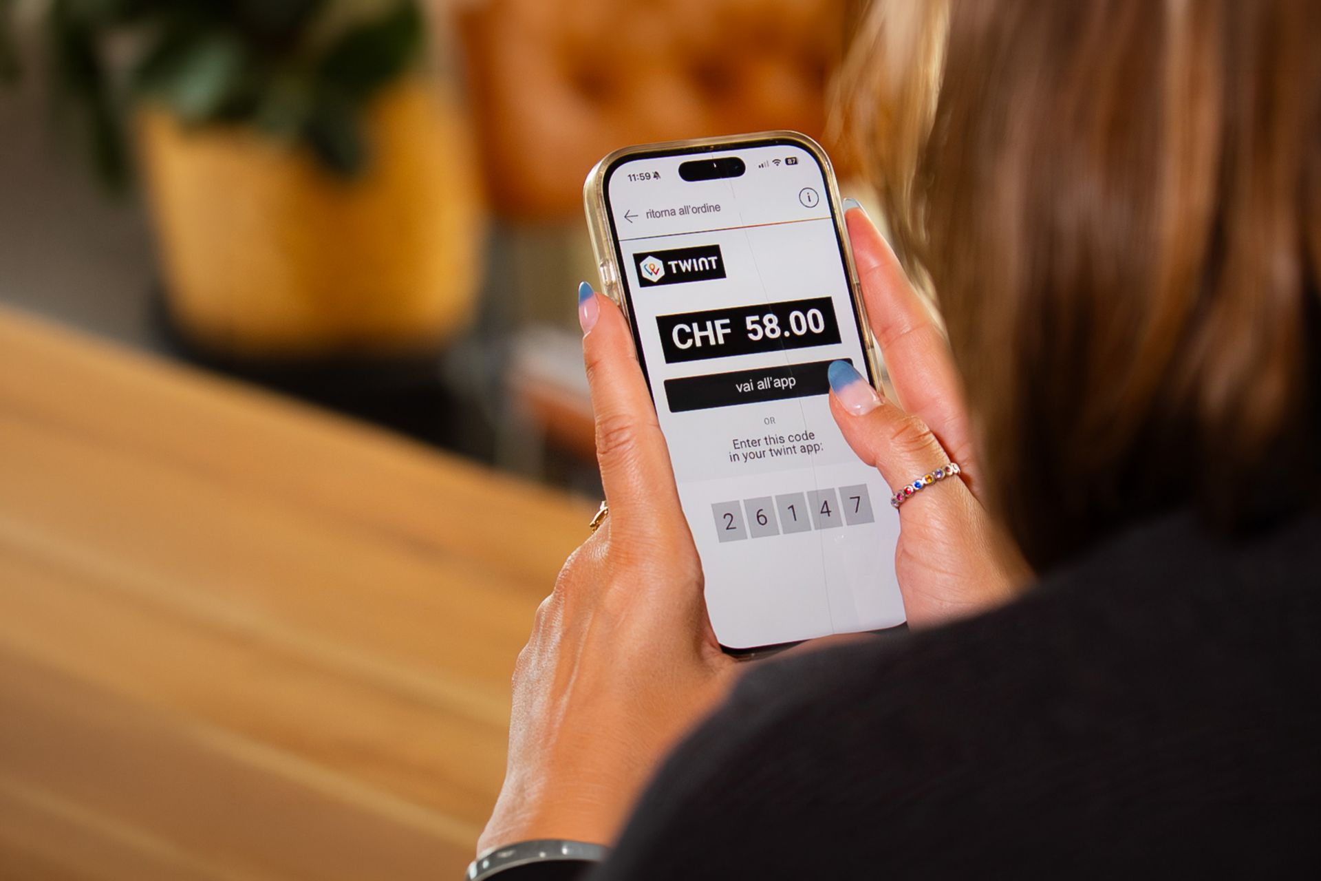 Display del cellulare con app TWINT e codice a 5 cifre