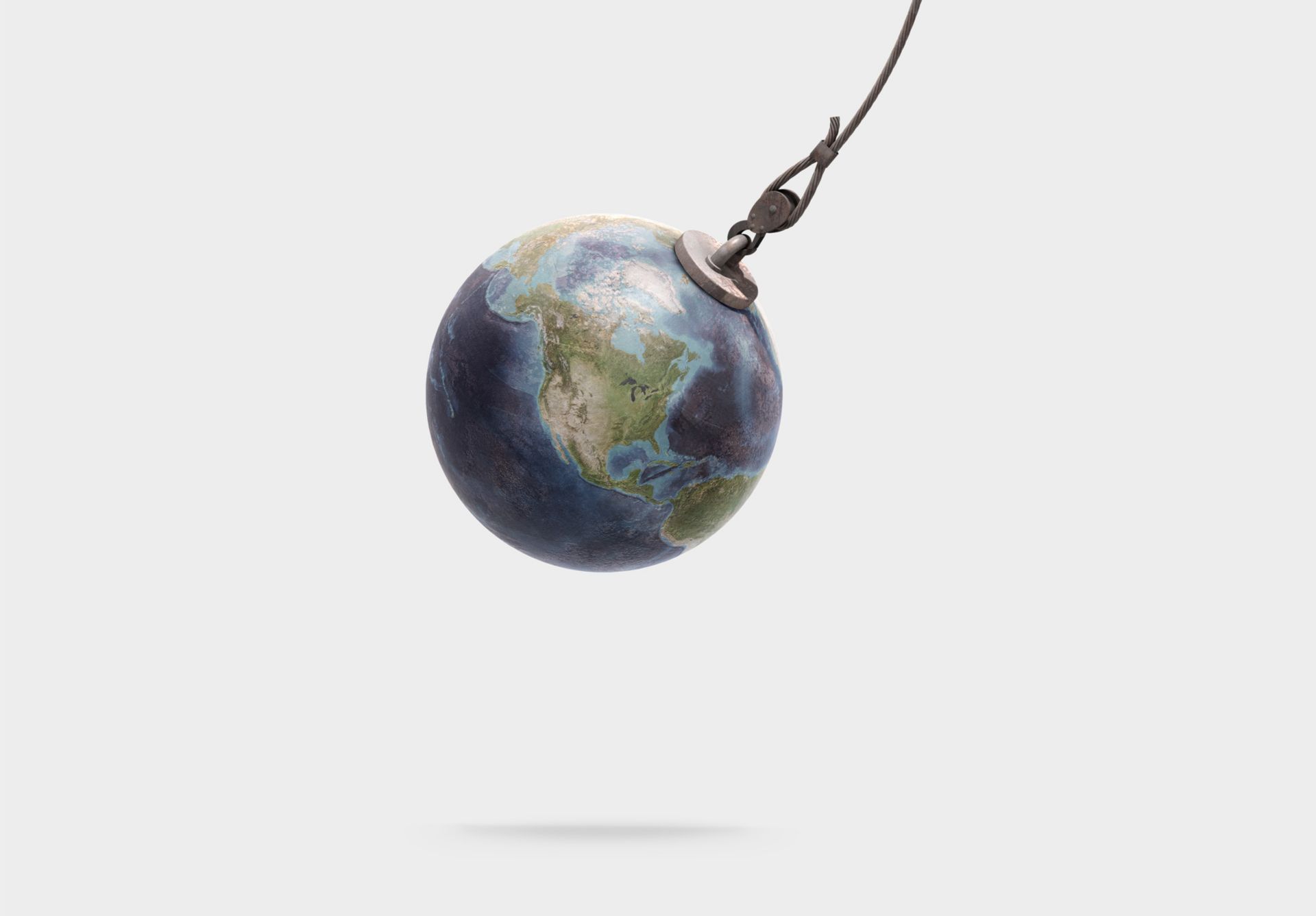 Le globe terrestre pend à un crochet